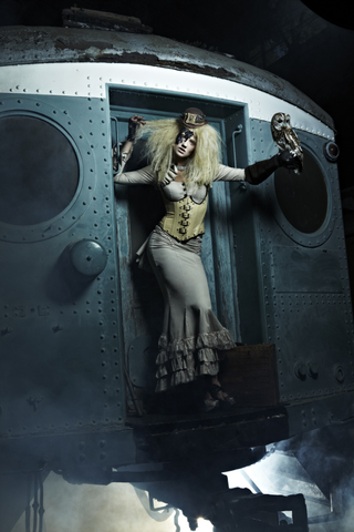 Illustration for article titled Top Model does Steampunk, thinks Steampunk means "Owl"